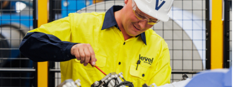 Level Electrical Hume technician performing industrial electrical maintenance in Canberra, representing local capability backed by national strength.
