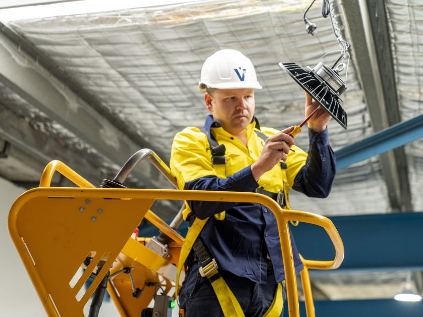 Level Electrical technician conducting commercial lighting installation as part of national electrical services delivered by Level Group Australia