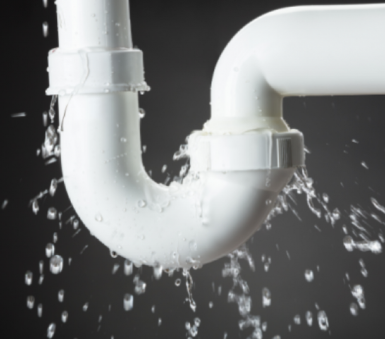 a white pipe leaking water