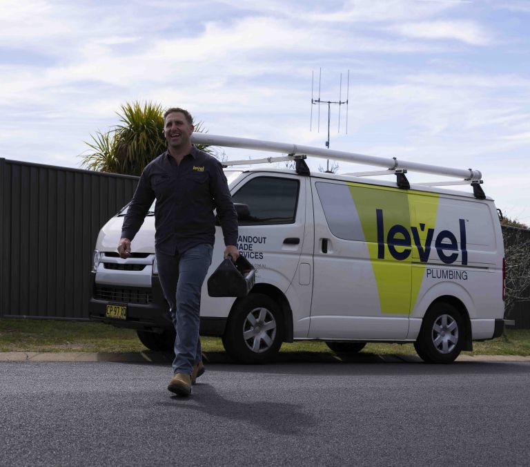 friendly plumber laughing van canberra