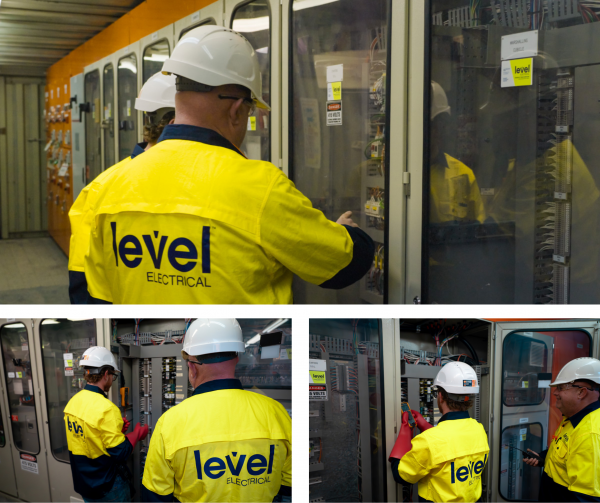 Level Electrical Taree technicians inspecting and wiring the upgraded motor control centre at the Possum Brush hard rock crushing plant.