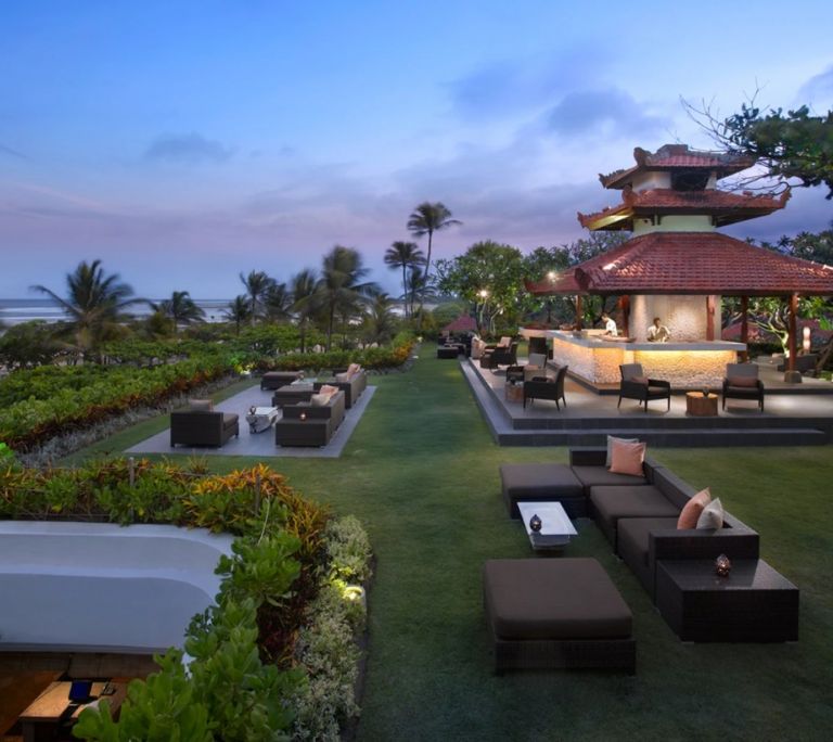 Outdoor terrace and gardens at the Grand Hyatt Bali conference location in Nusa Dua