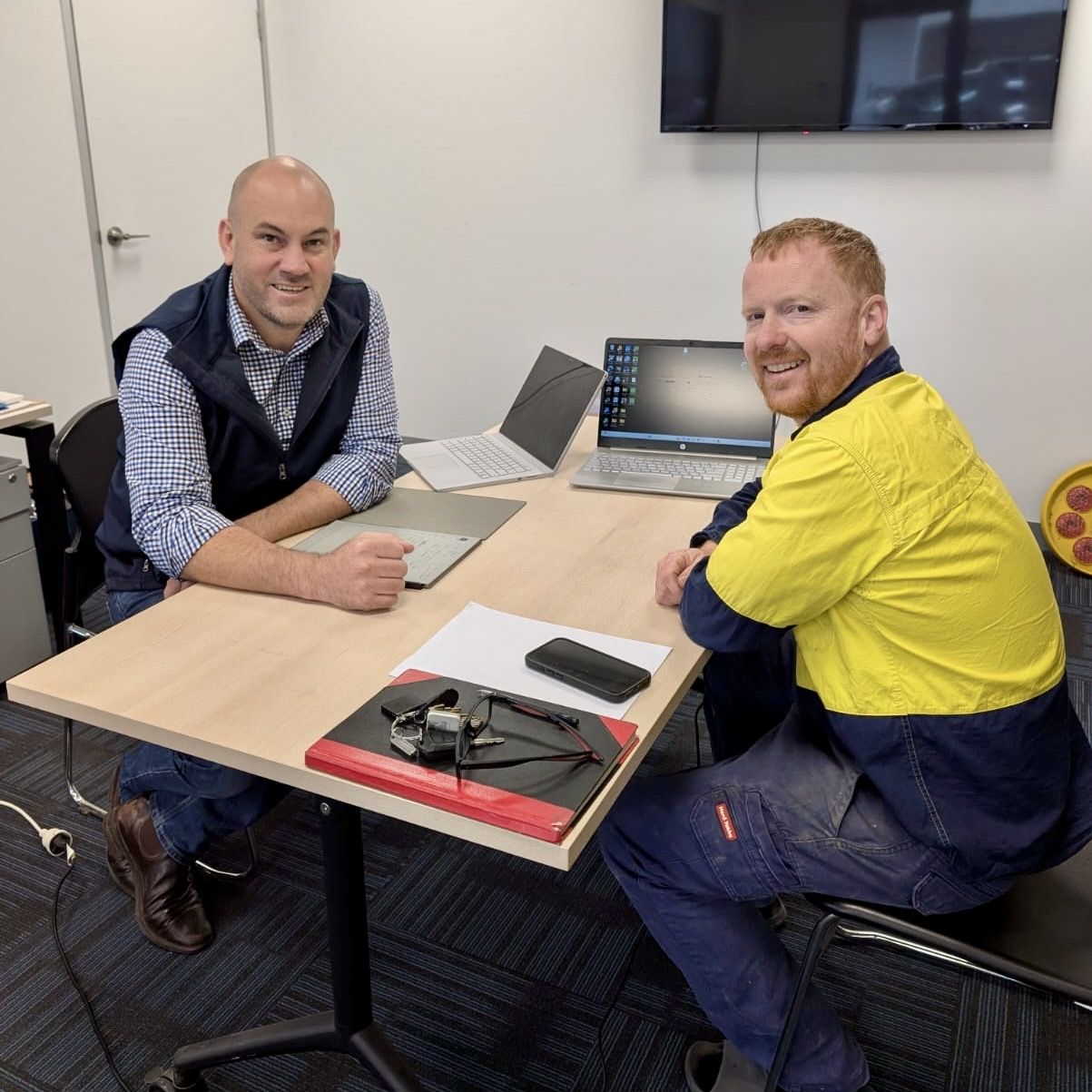 Peter Watson, Level State Manager, meeting with Glen Ramadge from Level Electrical & Automation Epping during a business planning session.