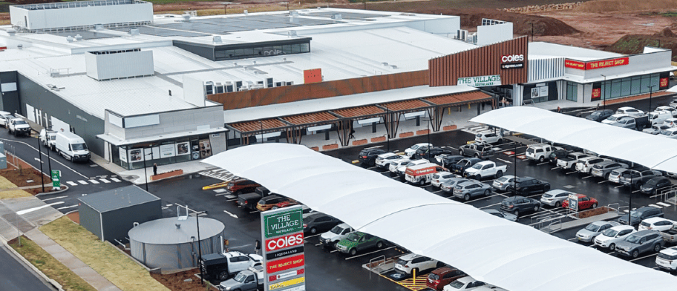 Aerial view of the completed Village Southlakes shopping center featuring Coles, specialty stores, and customer parking in South Dubbo.