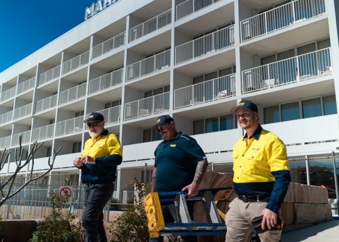 Level Electrical Newcastle Central team on site at Marina Bay Resort in Port Stephens after completing the full rewire, including lighting, power systems, and switchboard upgrades.