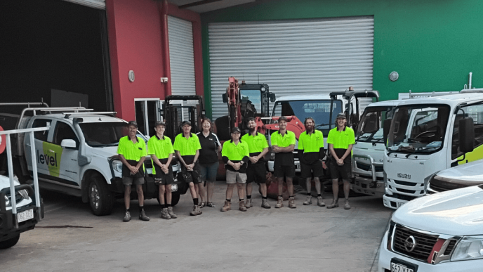 Level Plumbing Airlie Beach team with branded service vehicles, providing plumbing services across Airlie Beach, Cannonvale and the Whitsundays.