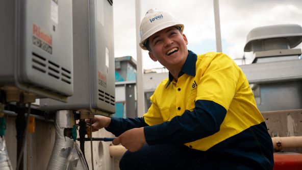 Level Plumbing Canberra technician installing a gas fitting system on site, delivering safe and compliant gas services