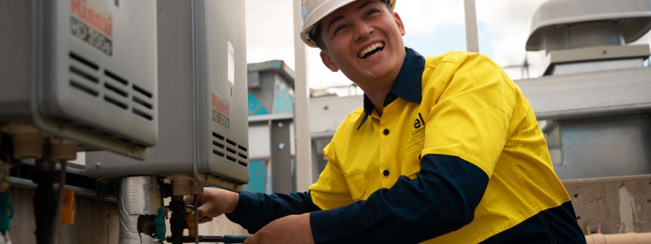 Level Plumbing Canberra technician installing a gas fitting system on site, delivering safe and compliant gas services