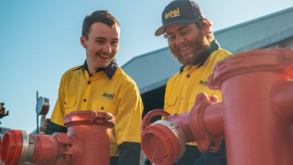 Level Plumbing Dubbo team performing onsite backflow testing on commercial fire protection systems