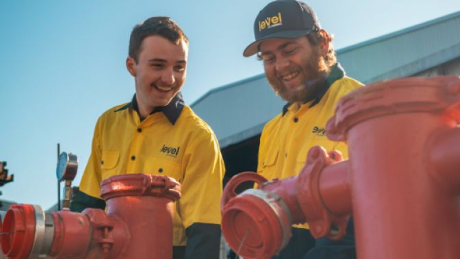 Level Plumbing Dubbo team performing onsite backflow testing on commercial fire protection systems