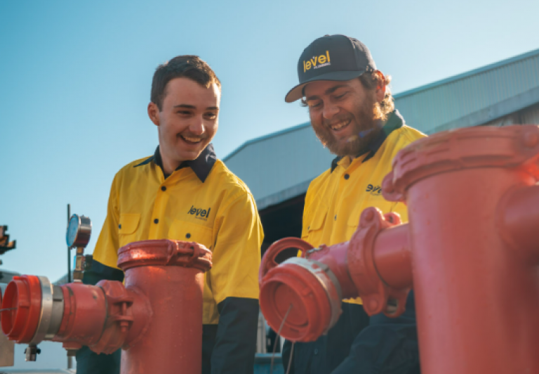 Level Plumbing Dubbo team performing onsite backflow testing on commercial fire protection systems