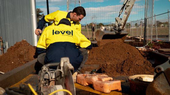 Level Plumbing Dubbo team completing commercial plumbing and civil works on a construction site in regional New South Wales, delivering large-scale infrastructure services.