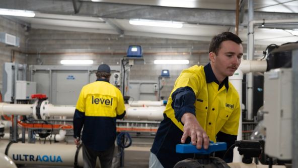 Level Plumbing Dubbo technicians inspecting advanced commercial water system to improve efficiency and sustainability