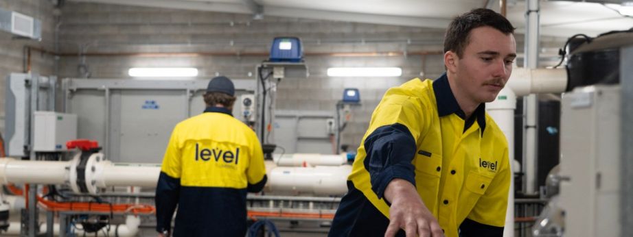 Level Plumbing Dubbo technicians inspecting advanced commercial water system to improve efficiency and sustainability