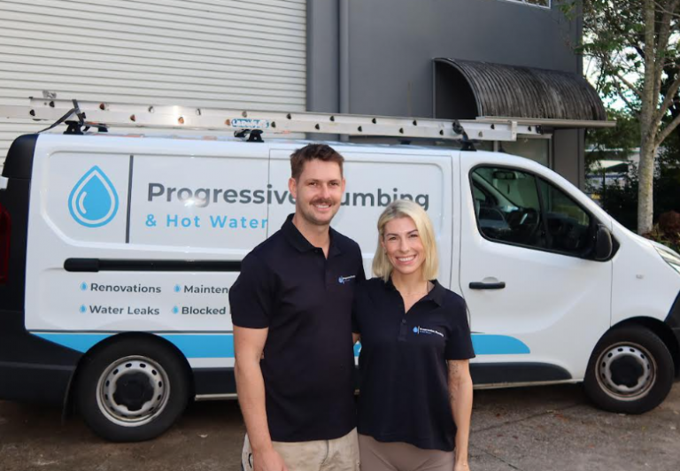 Jimmi Keller and Amelia from Level Plumbing Kunda Park standing in front of a Progressive Plumbing & Hot Water vehicle on the Sunshine Coast.